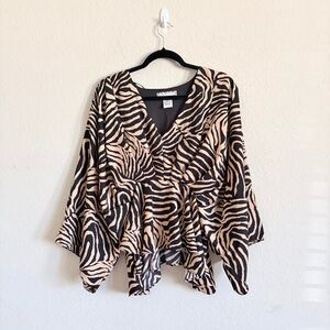 A. CALIN woman’s sophisticated zebra print blouse M wide sleeve peplum elegant
